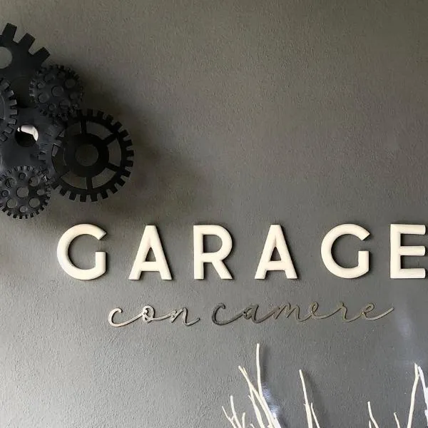 Garage con camere, hotel en Pieve di Soligo