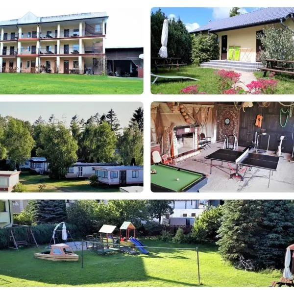 OW Wilk - pokoje i domki z aneksami kuchennymi, parking, plac zabaw, hotel v destinaci Leba