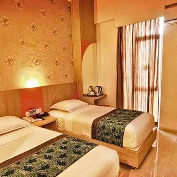 Hotel Dewarna Sutoyo Malang, khách sạn ở Kidal