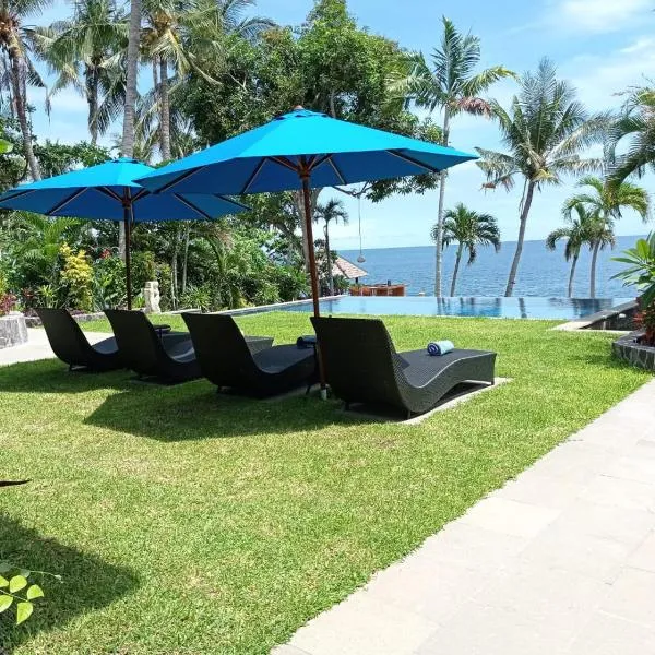 Absolute Beachfront Private Villa sleeps 6 with Infinity Pool on 1200m2 of Tropical Land, hotel sa Tulamben