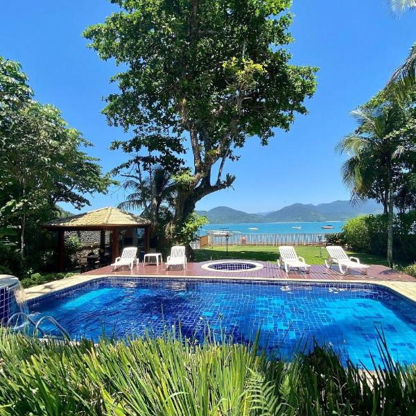 Magnífica casa pé na areia 4 suítes c/ ar e piscina