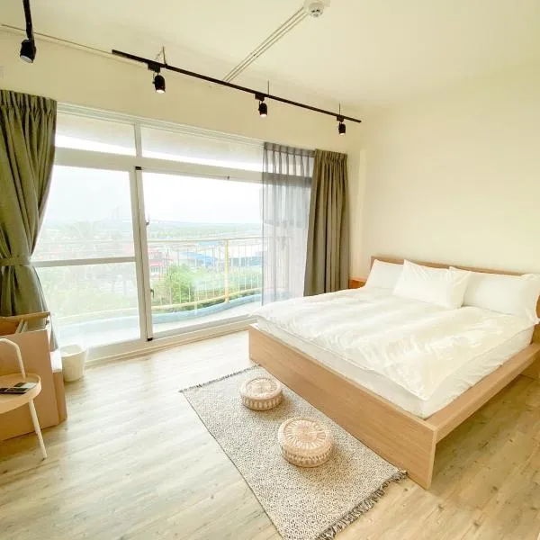艾睏khùn行旅, hotel v destinaci Donggang