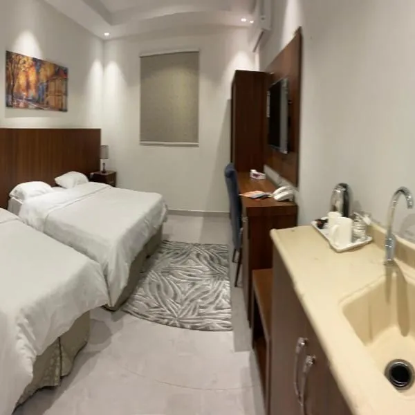 فندق كنان سويت, hotel u gradu Sulţānah