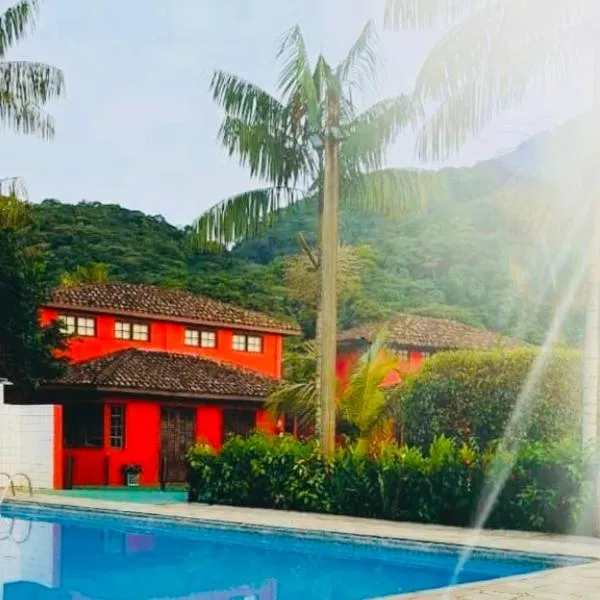 Chales Terra Pura, hotel in Camburi