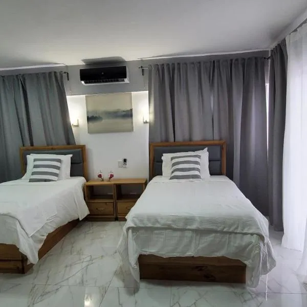 Boca Grande Hotel Suites, отель в городе Куэвас