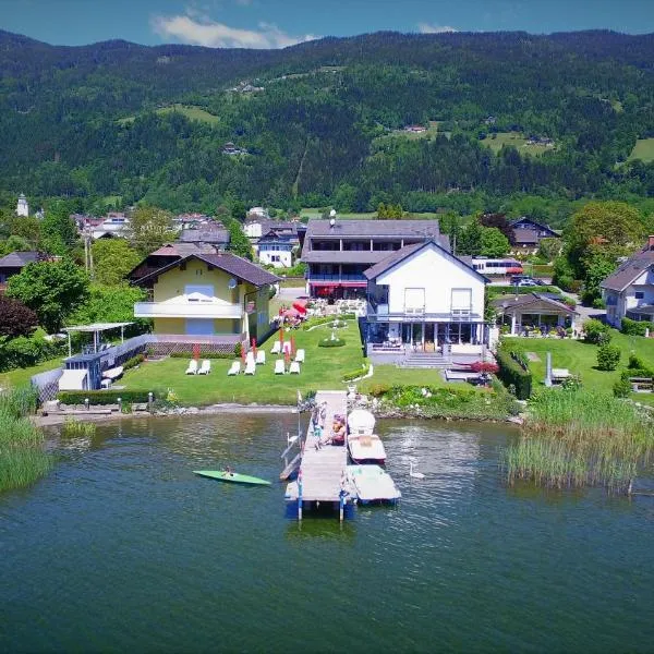 Seehaus "Kärnten Inn" mit direktem Seezugang und E-Ladestation, hotel in Bodensdorf