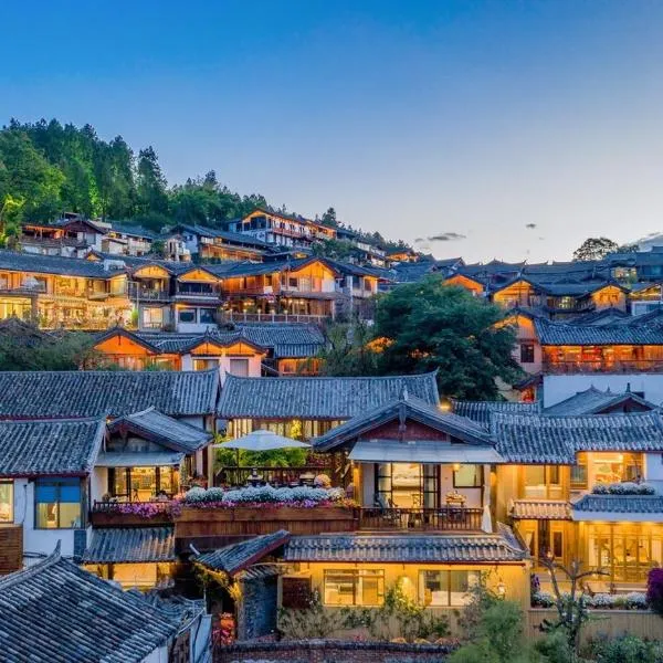 Lijiang Sunshine Nali Inn, готель у місті Baisha