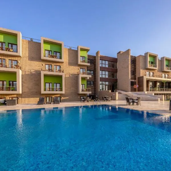 Dhara Residence E2 Lodge Hotel, hotell i Madinat Sittah Uktobar