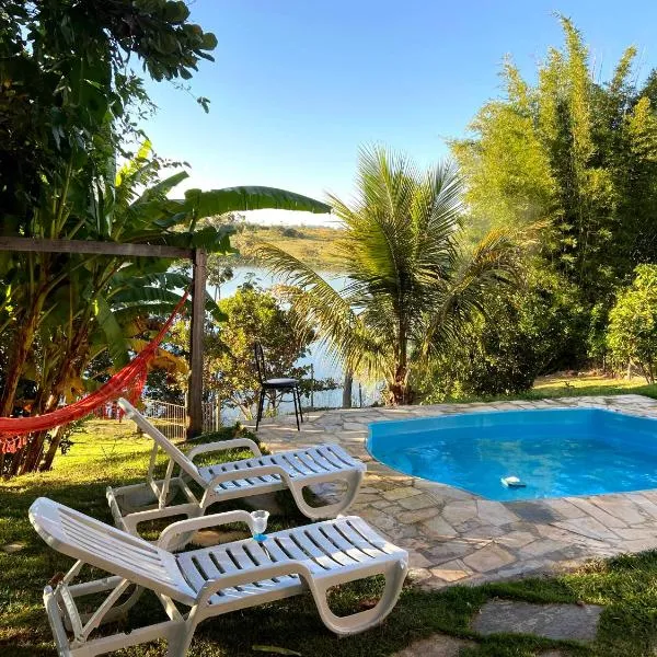 Casa com piscina fundo pra represa e AR Condicionado CasinhaBrancaDeVaranda, hotel em Perdões