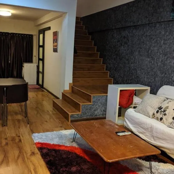 Cozy designer loft near KL city center, готель у місті Ампанг