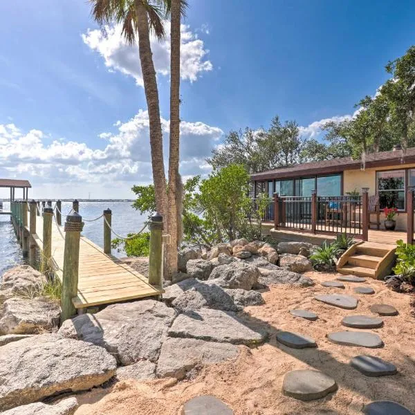 Riverfront Merritt Island Bungalow with Dock and Deck, hotel in Merritt Island