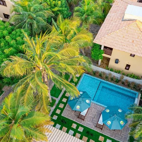Sombra do Coqueiro Villas - 150m da Praia, hotel in Luis Correia