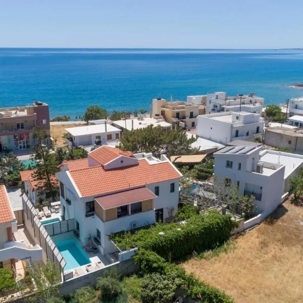 Paradisos luxury villas next to beach, hotel en Agia Fotia