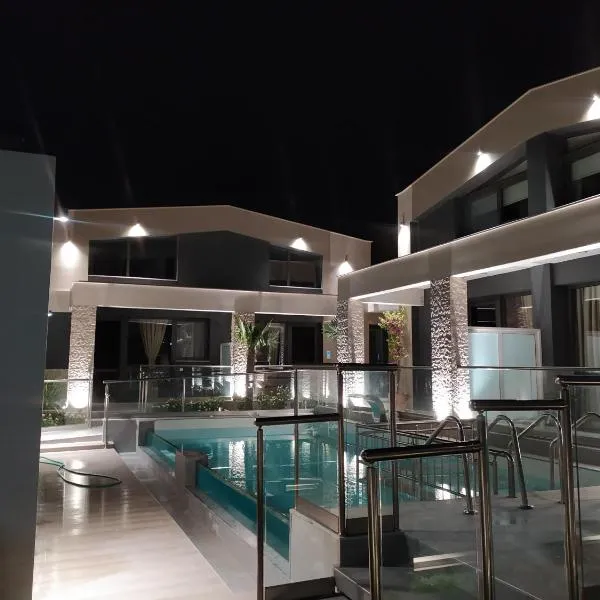 Amalia Deluxe Villas: Nea Vrasna şehrinde bir otel