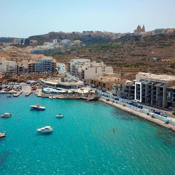 Malta's Beachfront Apartment in Mellieha, Hotel in Mellieħa