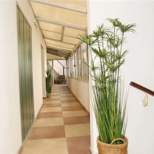 Real Ros Hostel, hotel in Rosario