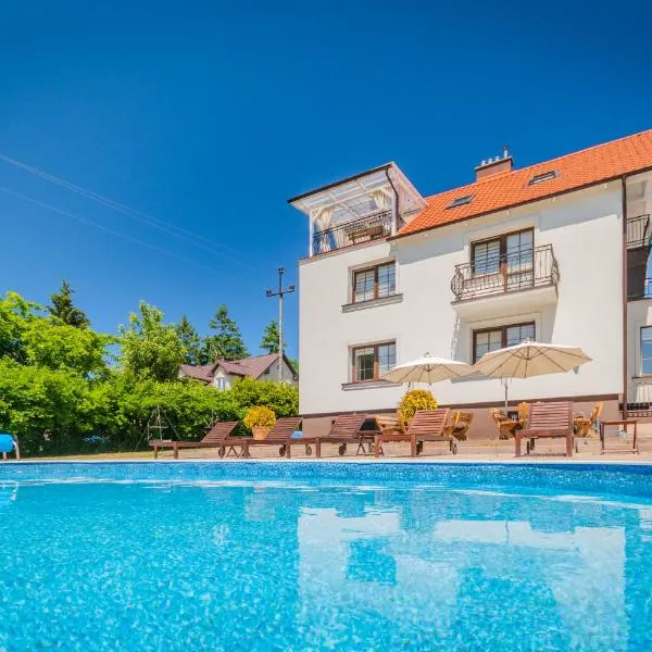 Bryza Jantar apartamenty z sauną & domki z kominkami, hotel i Jantar