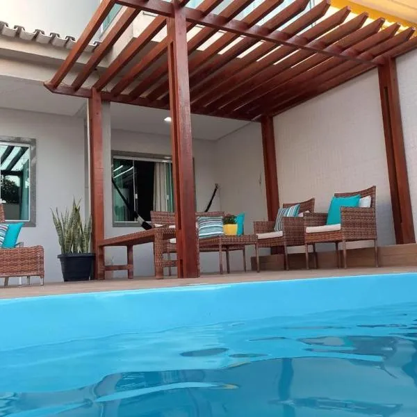 Casa com Piscina e Churrasqueira e excelente Localização em Piuma, hotel v destinaci Piúma