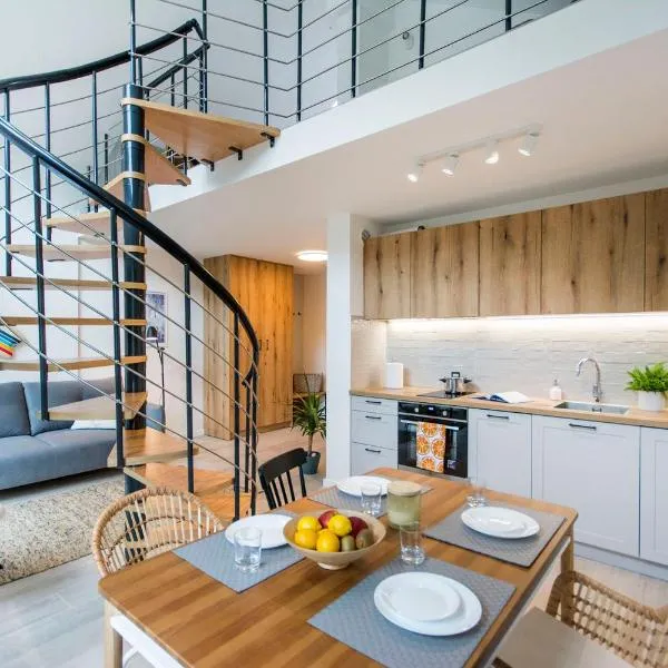 Słoneczna Przystań - Apartamenty dwupoziomowe โรงแรมในSobieszewo