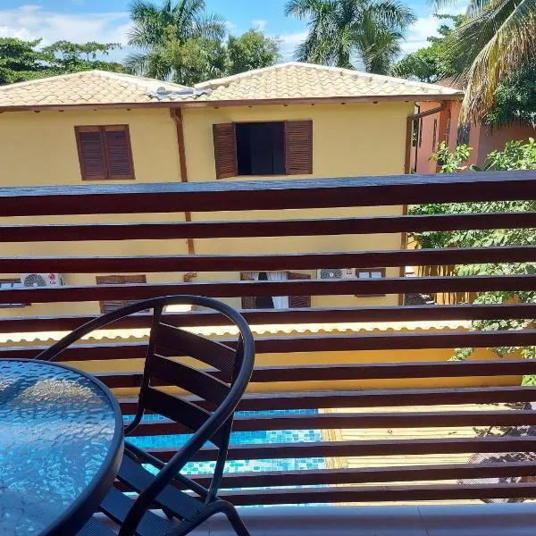Cotia - Novo Flat com Piscina, 50mts da praia, churrasqueira privativa, ar con, wi-fi, netflix, garagem