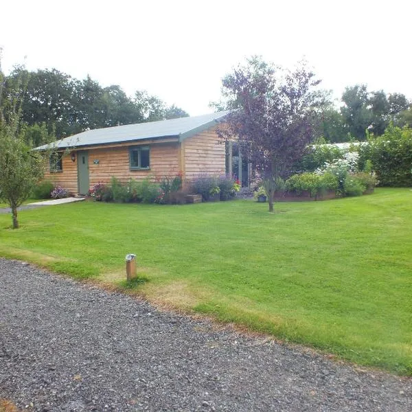 The Potting Shed And The Garden Shed Self Catering、カーマーゼンのホテル