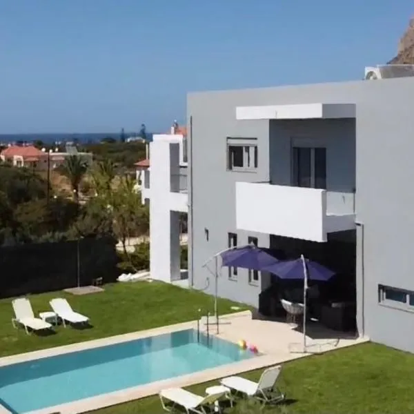 Helios a modern large villa with private pool set in a quiet location, hotelli kohteessa Stavros