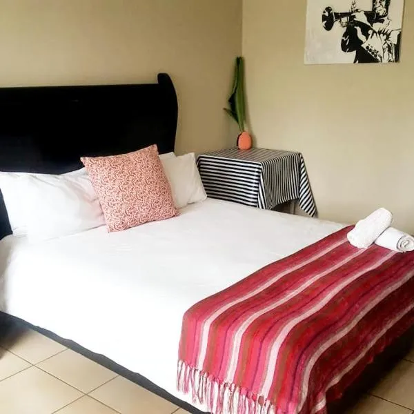 Dumelang Executive Lodge- Cottages in Sandton、ヨハネスブルグのホテル