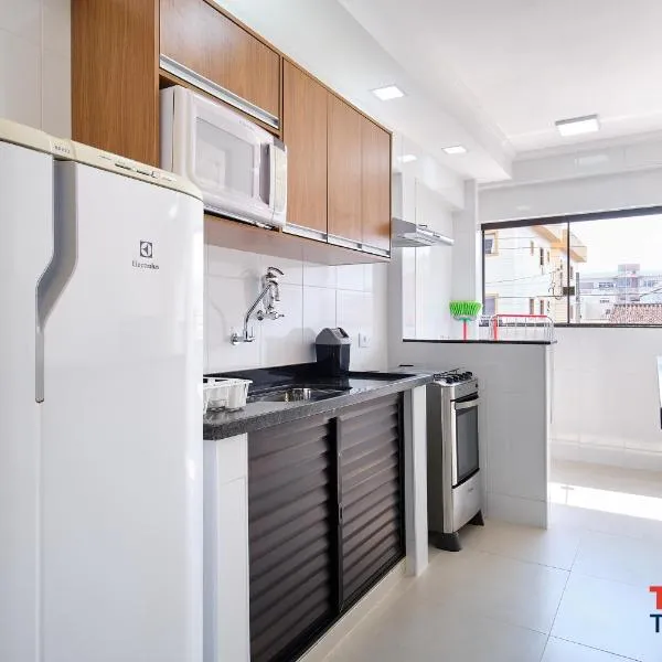 Apartamento com ar condicionado à 100 metros da praia - Edifício Ibiza، فندق في أوباتوبا