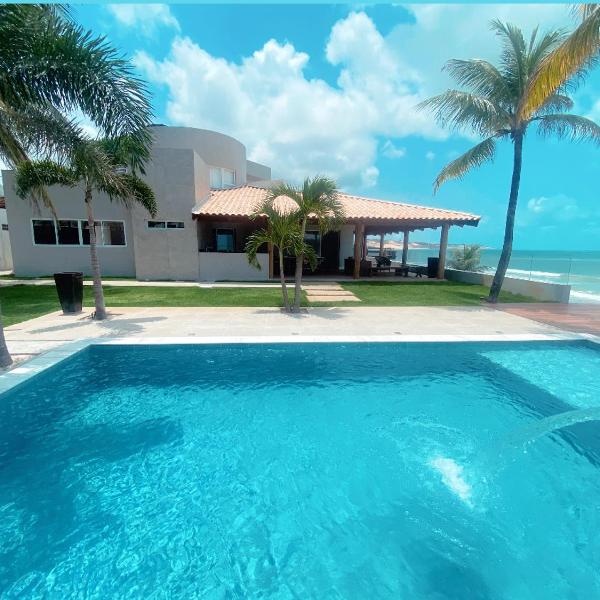 Luxo e pé na areia