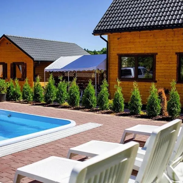 Bungalow by Wiselka Lake & Baltic Beach, hotel en Wisełka