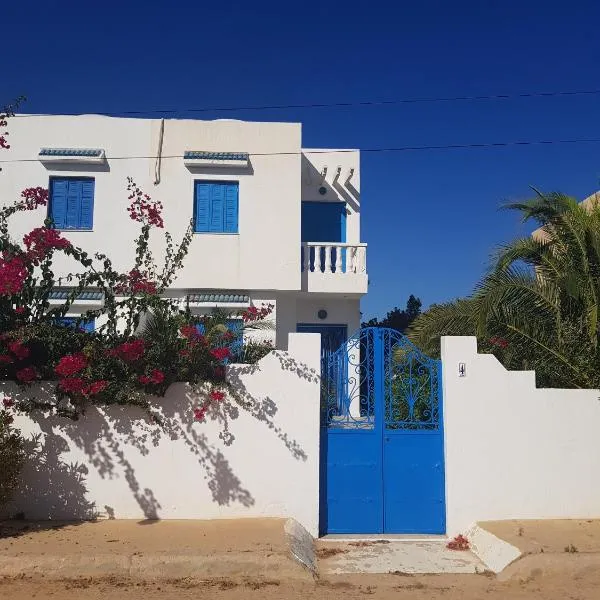 Maison les Palmiers 300m de la plage، فندق في أغير