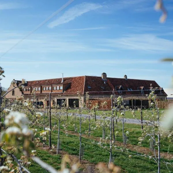 Hoeve Roosbeek, hotel in Nieuwerkerken