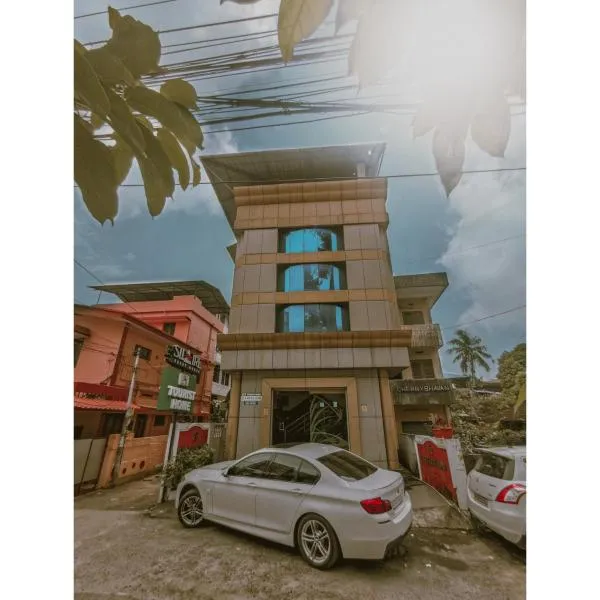 New AS Tourist Home, hótel í Ernakulam