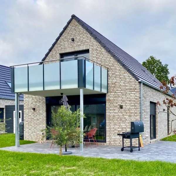 Ferienhaus MOIN. am Harkebrügger See mit Sauna, hotel en Barßel