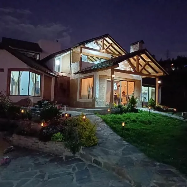 Cabaña El Encanto De ALU, hotel in Paipa
