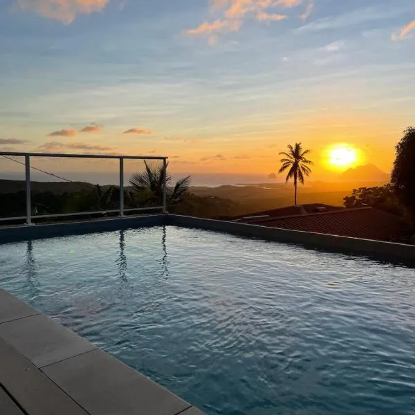LES VILLAS PAMEYAQUE 2 F2 avec 1 piscine et 1 F3 avec 1 piscine, Superbe Vue sur la mer, hotel a Rivière-Salée