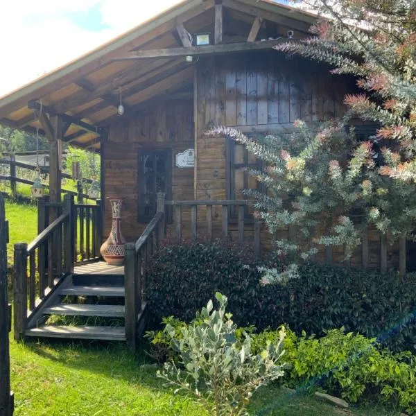 Acogedora cabaña de madera en la naturaleza para desconectarse, hotel v destinaci Sogamoso