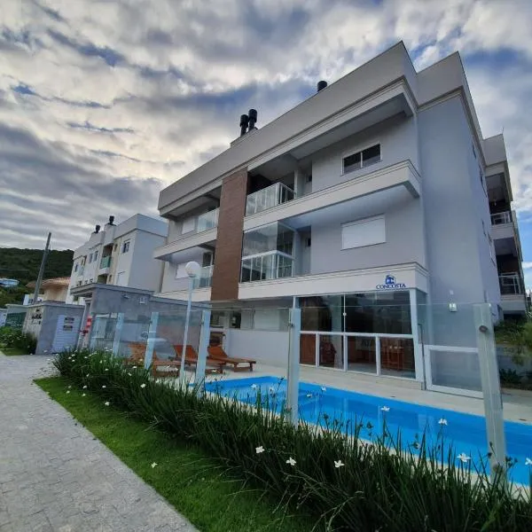 고베르나도르 셀소 하모스에 위치한 호텔 Apto na praia de Palmas, próximo ao mar, climatizado e com piscina