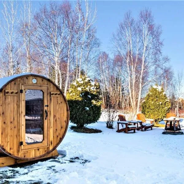 Spa, sauna et foyer : Le Phare de Baie-Saint-Paul, hotel v destinaci Baie-Saint-Paul