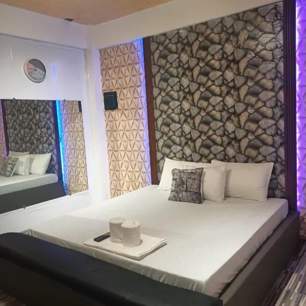 DJCI Apartelle Walk to Robinson & NE Pacific Mall 3 Min to SM Cabanatuan、カバナチュアンのホテル