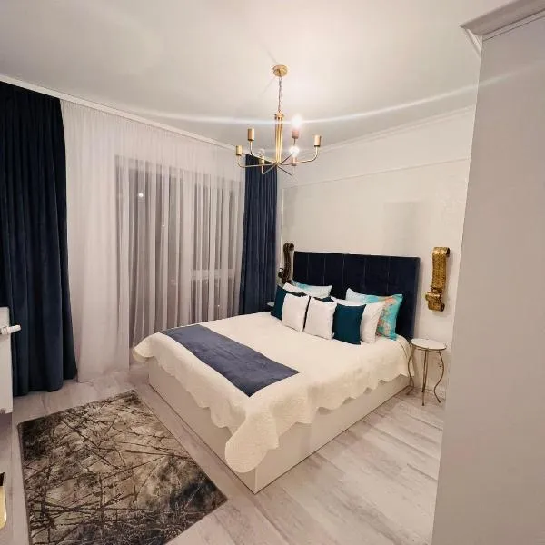 Apartament Larysse، فندق في Husasău de Criş