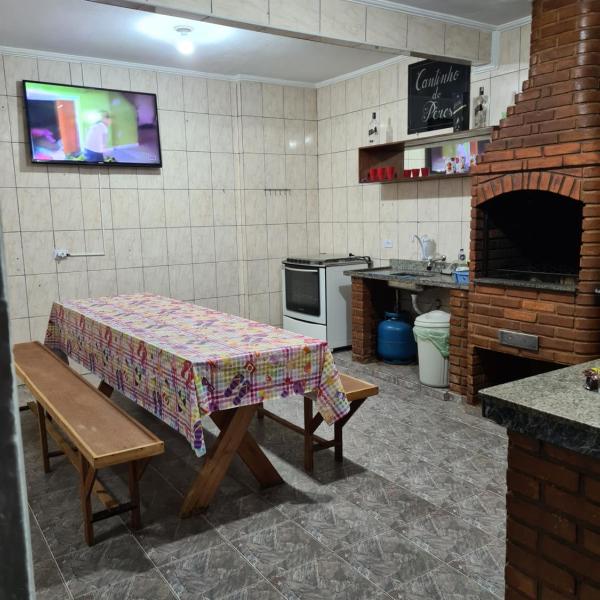 Casa grande e confortável até 16 pessoas com churrasqueira e garagem para 8 carros