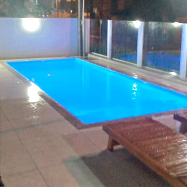 Apto na praia de Palmas, climatizado, com piscina, próximo ao mar e com jardim privativo - Foto 4