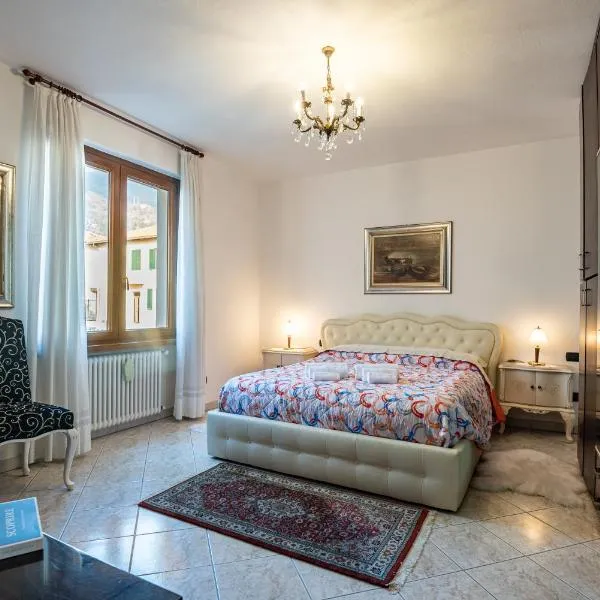 Apartment with garden a few steps from the lake - Larihome A06, hotel in Dongo