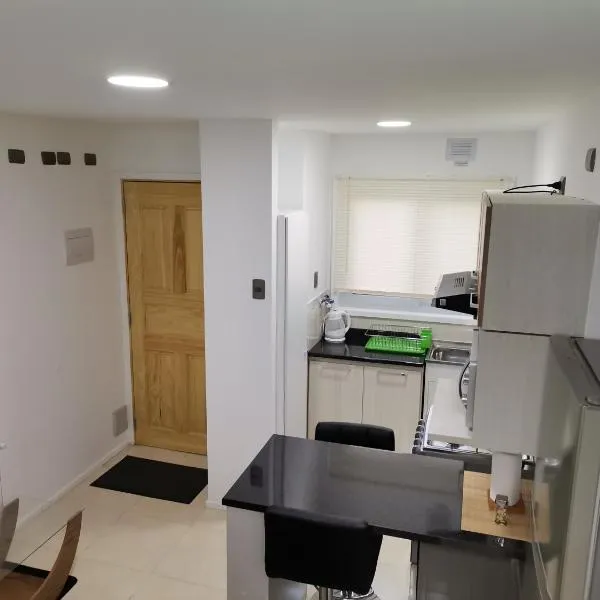 Apartasuite Altos del Bosque, hotel u gradu Ojo Bueno