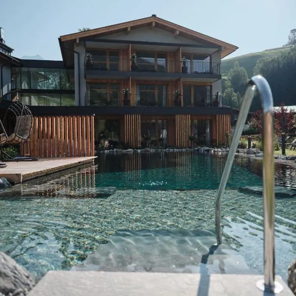 Wellness und Brunch Hotel MorgenZeit beheizter Naturpool mit Sandstrand Genuss Frühstück bis 13 Uhr Hochkönig Sommercard, hotel v destinácii Maria Alm am Steinernen Meer