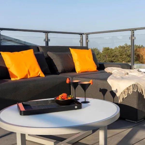 Penthouse mit Dachterrasse, Meerblick, Klimaanlage, Gasgrill, Kamin, Luxus-Design-Apartment, 2 Minuten zum Strand, hotell sihtkohas Binz
