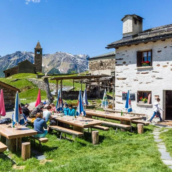 Rifugio Alpe San Romerio, מלון בBrusio