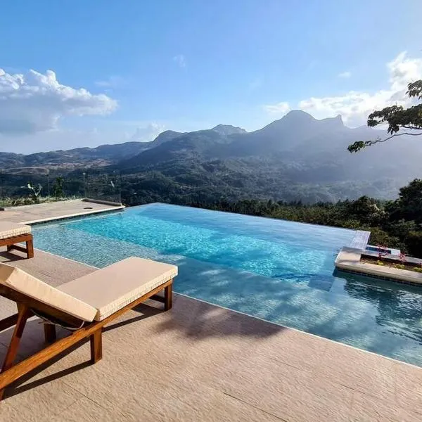 Cabaña con Espectacular Vista y Piscina Climatizada, готель у місті Чаме