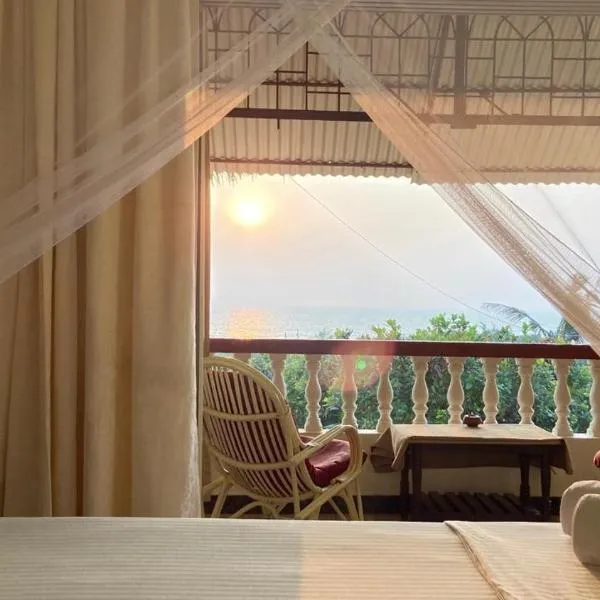 Dmellos Sea View Home, hotel in Candolim